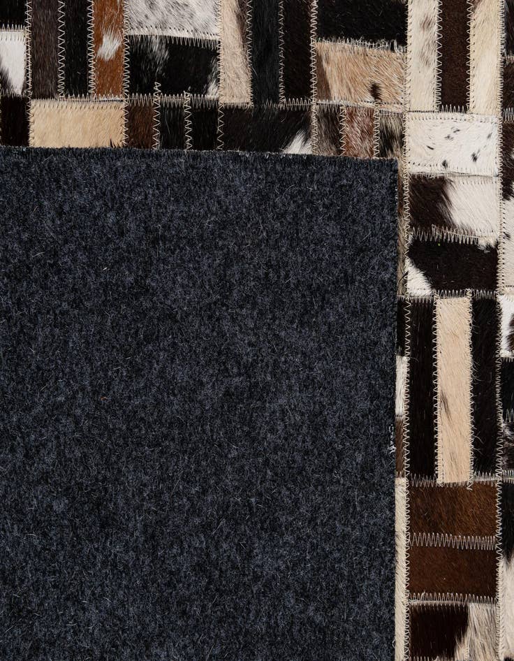 Detail image of  5' x 7' 11 Cowhide - Patchwork Rug