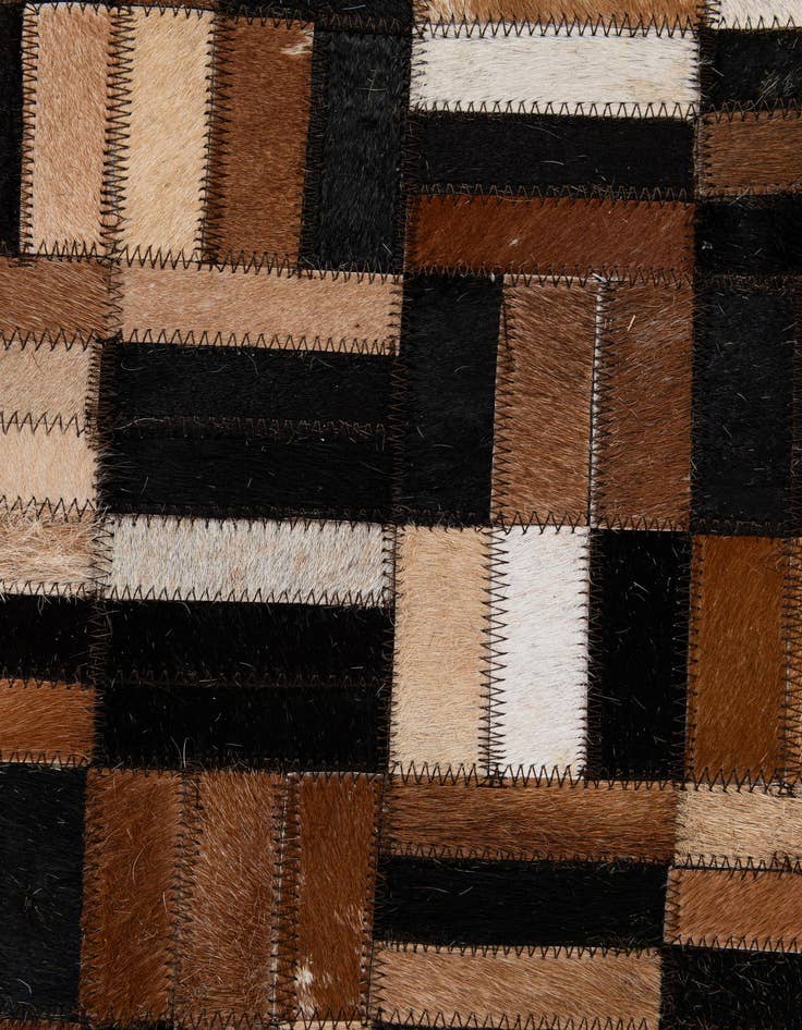 Detail image of  4' 11 x 7' 10 Cowhide - Patchwork Rug