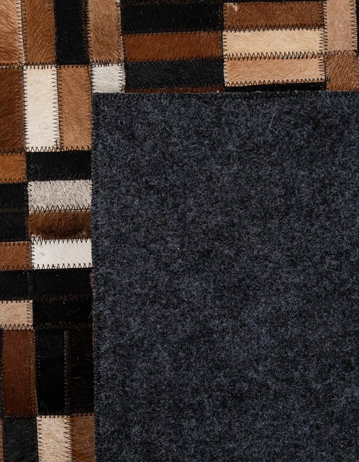 Detail image of  4' 11 x 7' 10 Cowhide - Patchwork Rug