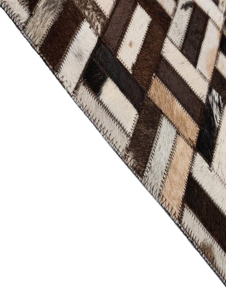 Detail image of  5' x 7' 11 Cowhide - Patchwork Rug