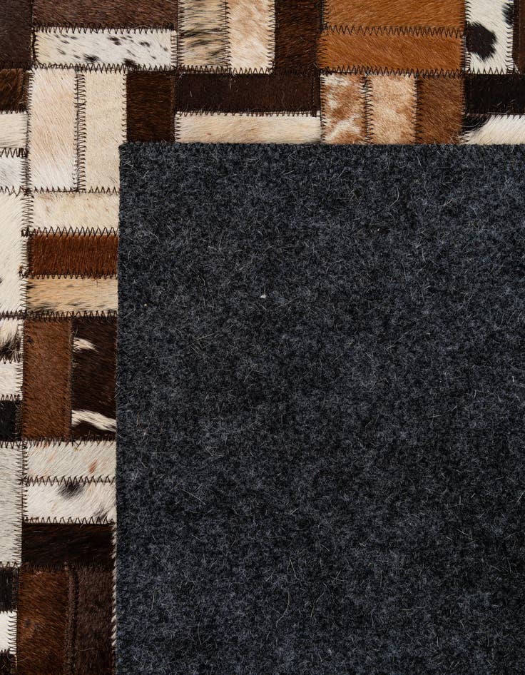 Detail image of  5' x 7' 11 Cowhide - Patchwork Rug
