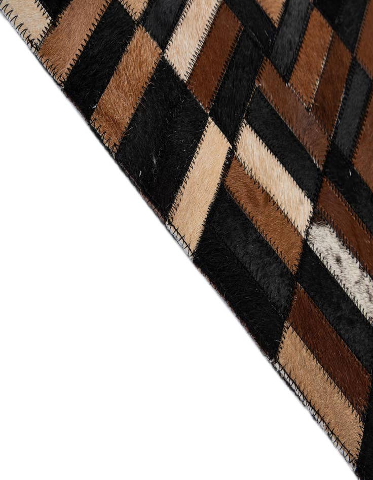 Detail image of  4' 11 x 7' 11 Cowhide - Patchwork Rug