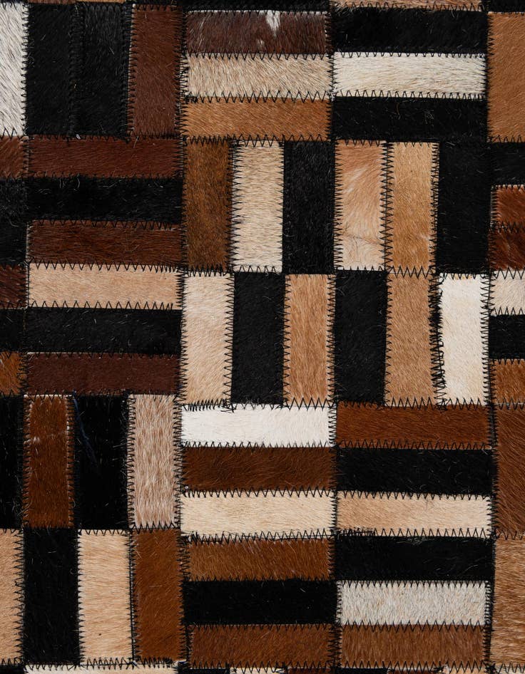 Detail image of  4' 11 x 7' 11 Cowhide - Patchwork Rug