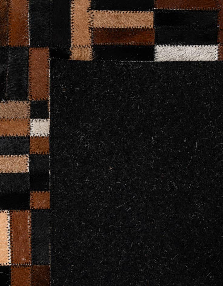 Detail image of  4' 11 x 7' 11 Cowhide - Patchwork Rug