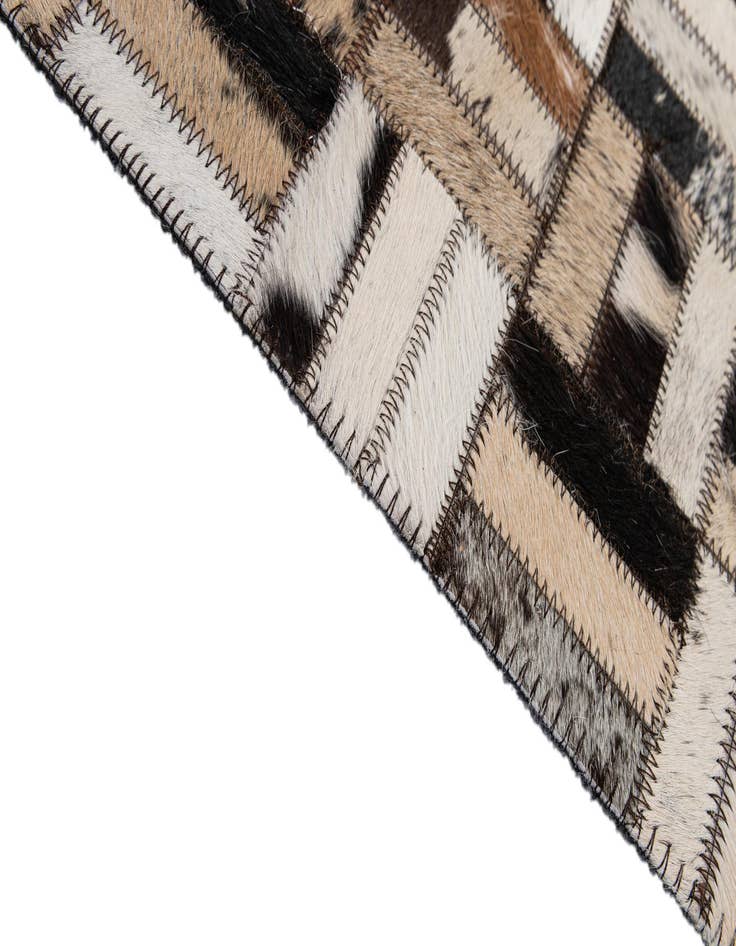 Detail image of  4' 11 x 7' 9 Cowhide - Patchwork Rug