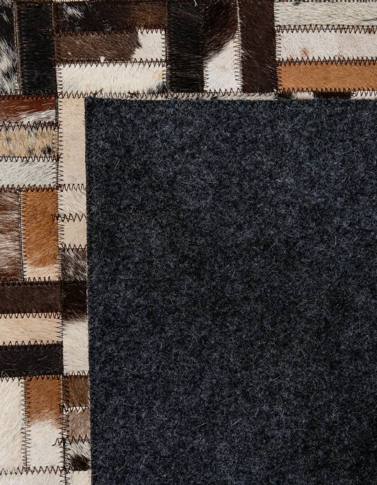 Detail image of  4' 11 x 7' 9 Cowhide - Patchwork Rug