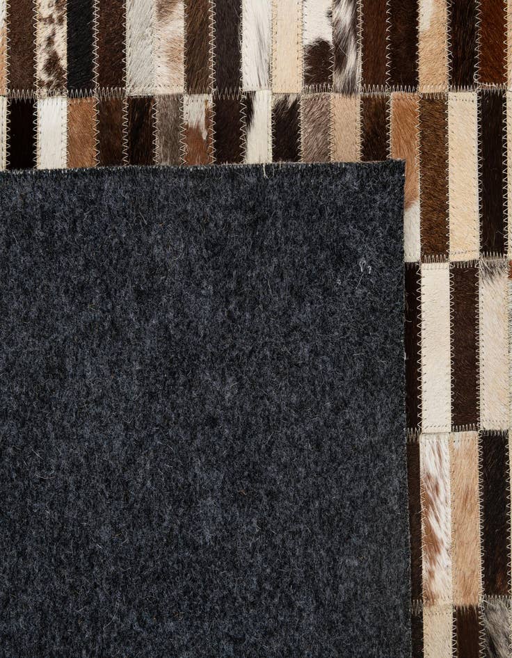 Detail image of  5' x 7' 11 Cowhide - Patchwork Rug