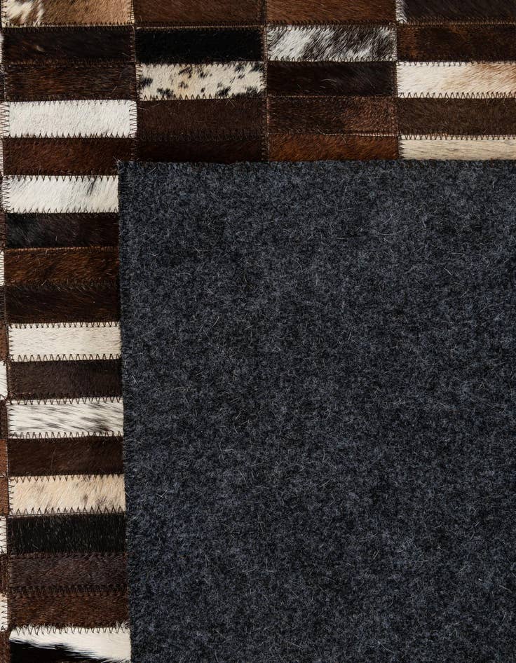 Detail image of  5' x 7' 11 Cowhide - Patchwork Rug