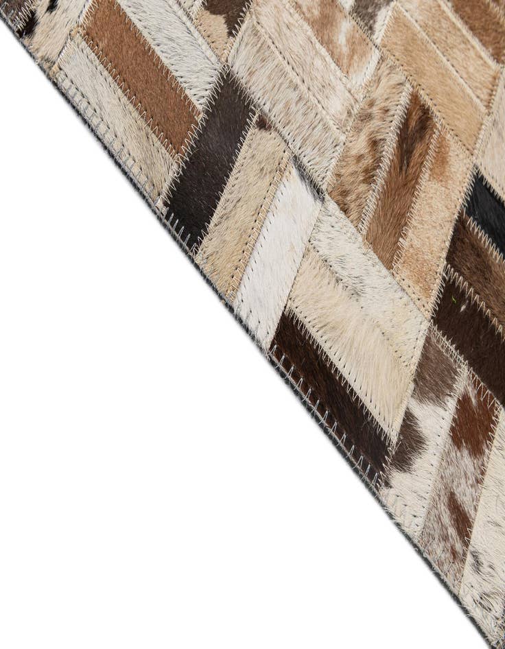 Detail image of  4' 11 x 7' 11 Cowhide - Patchwork Rug