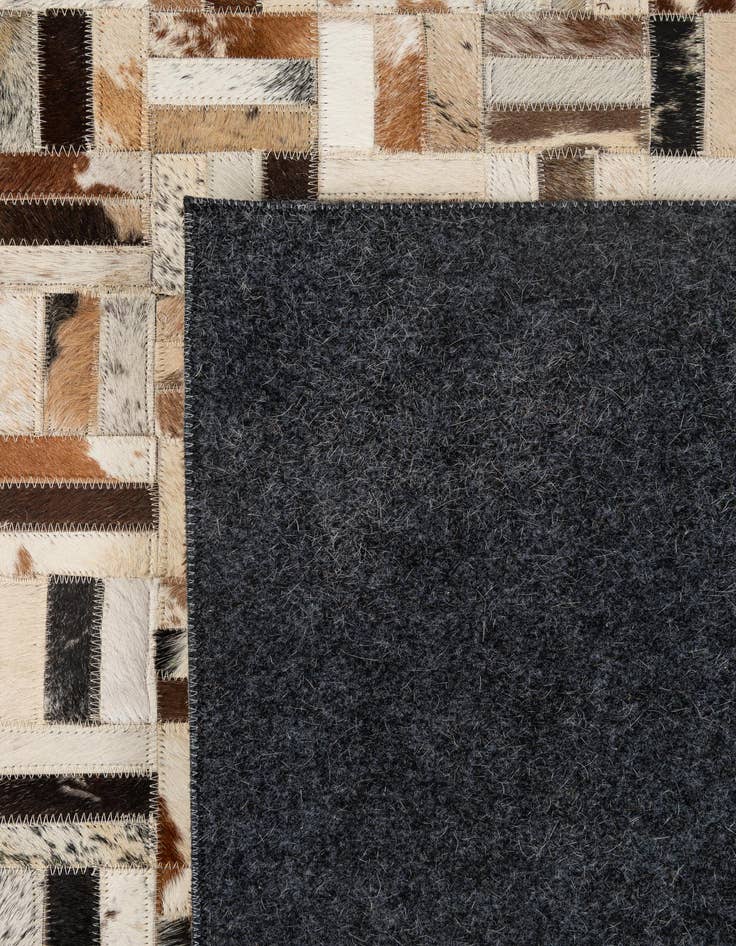 Detail image of  4' 11 x 7' 11 Cowhide - Patchwork Rug