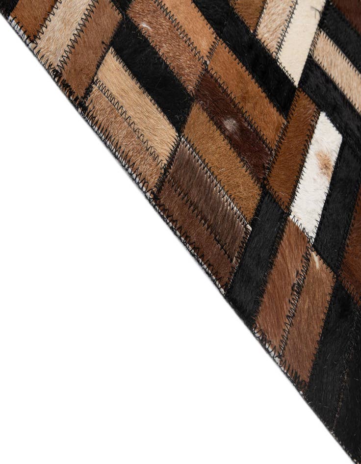 Detail image of  4' 11 x 8' 1 Cowhide - Patchwork Rug