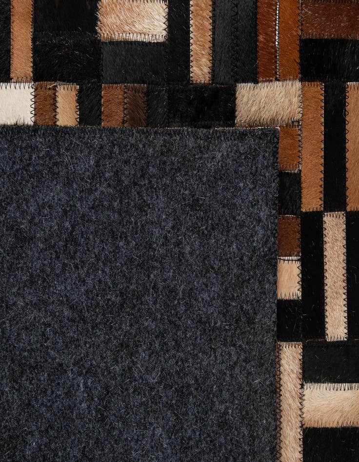 Detail image of  4' 11 x 8' 1 Cowhide - Patchwork Rug