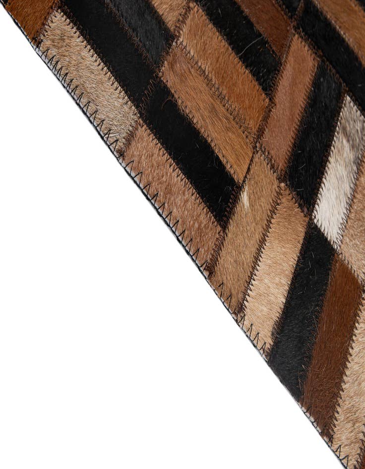 Detail image of  5' x 7' 11 Cowhide - Patchwork Rug
