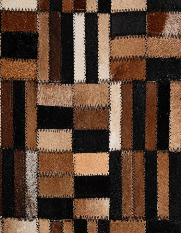 Detail image of  4' 11 x 7' 10 Cowhide - Patchwork Rug