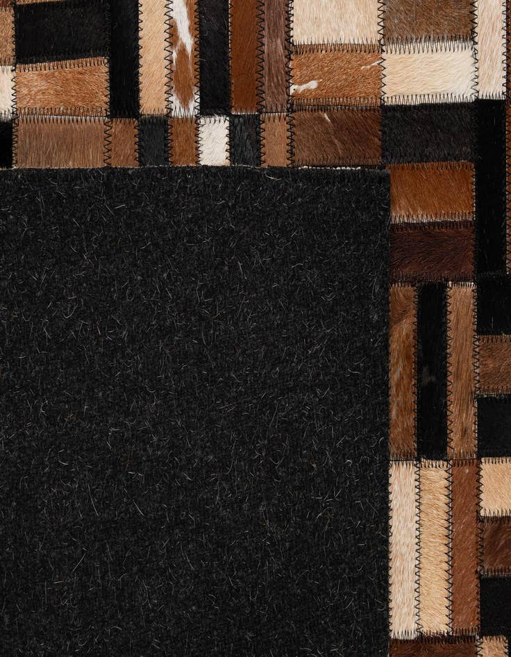 Detail image of  4' 11 x 7' 10 Cowhide - Patchwork Rug