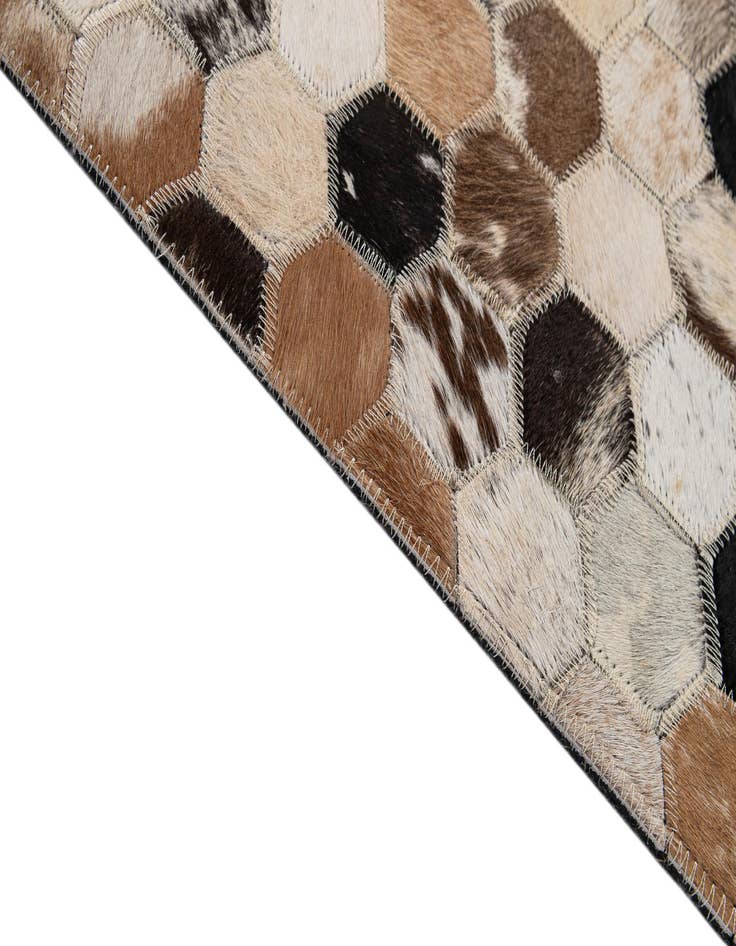 Detail image of  5' 1 x 7' 11 Cowhide - Patchwork Rug