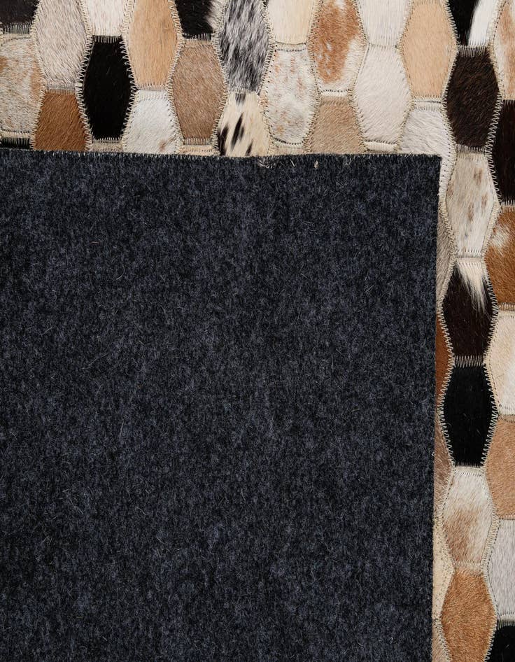 Detail image of  5' 1 x 7' 11 Cowhide - Patchwork Rug