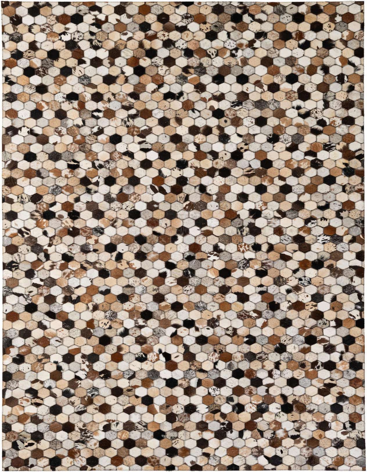 A rectangular 5x8 multi-colored cowhide patchwork rug featuring a modern hexagonal pattern in various natural brown, black, and white tones.