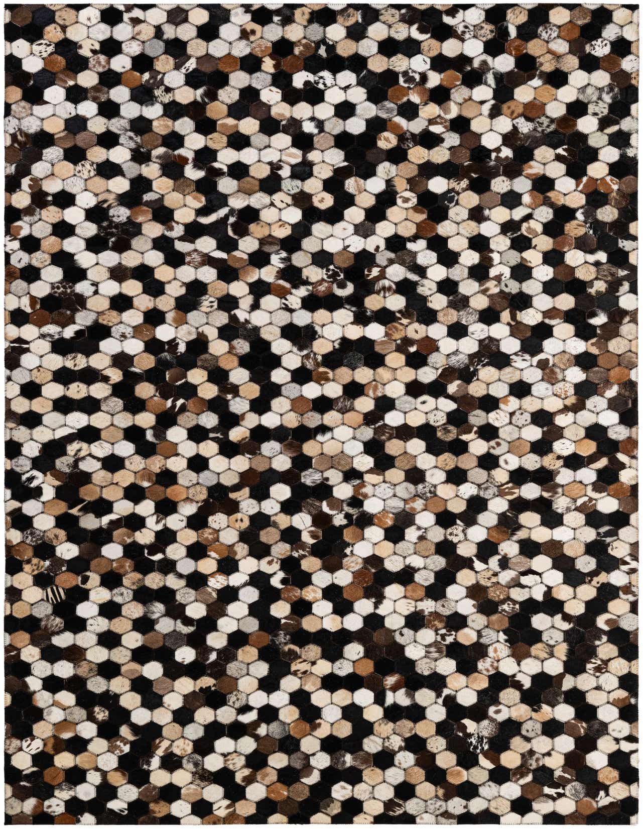 A 5x8 rectangular multi-colored cowhide rug with a modern hexagonal patchwork pattern in shades of black, brown, and white.