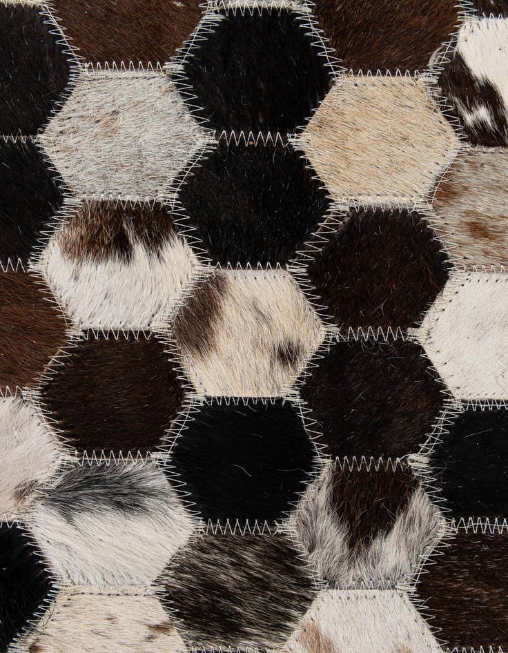 Detail image of  5' 1 x 7' 11 Cowhide - Patchwork Rug