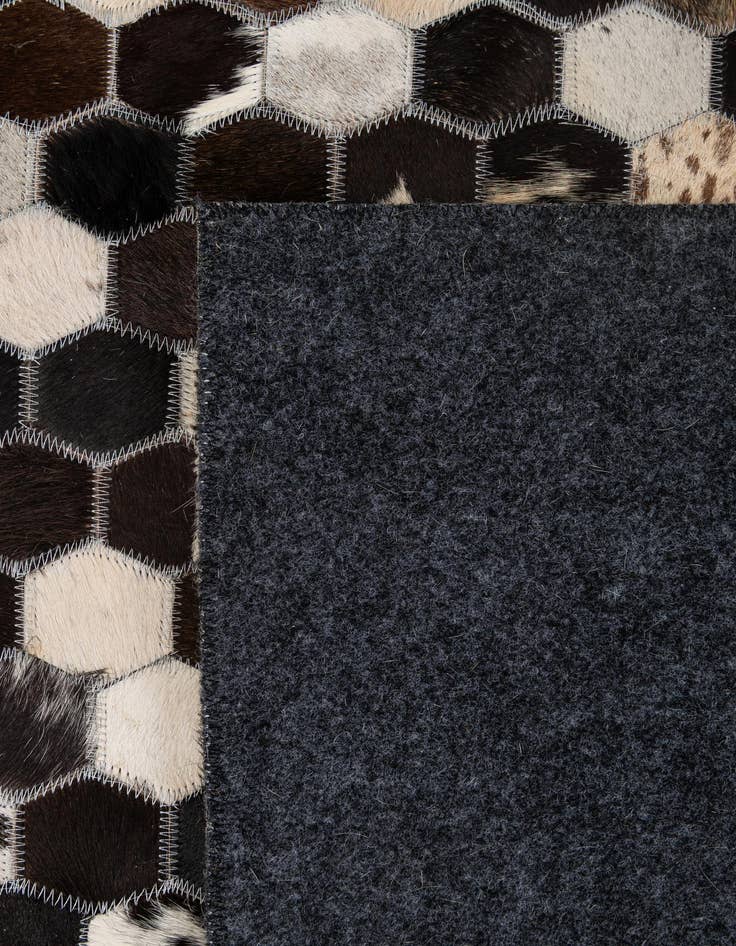 Detail image of  5' 1 x 8' 1 Cowhide - Patchwork Rug