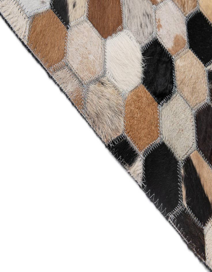 Detail image of  5' 1 x 7' 11 Cowhide - Patchwork Rug