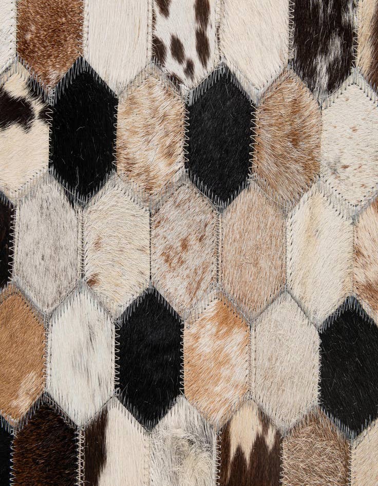 Detail image of  5' 1 x 7' 11 Cowhide - Patchwork Rug