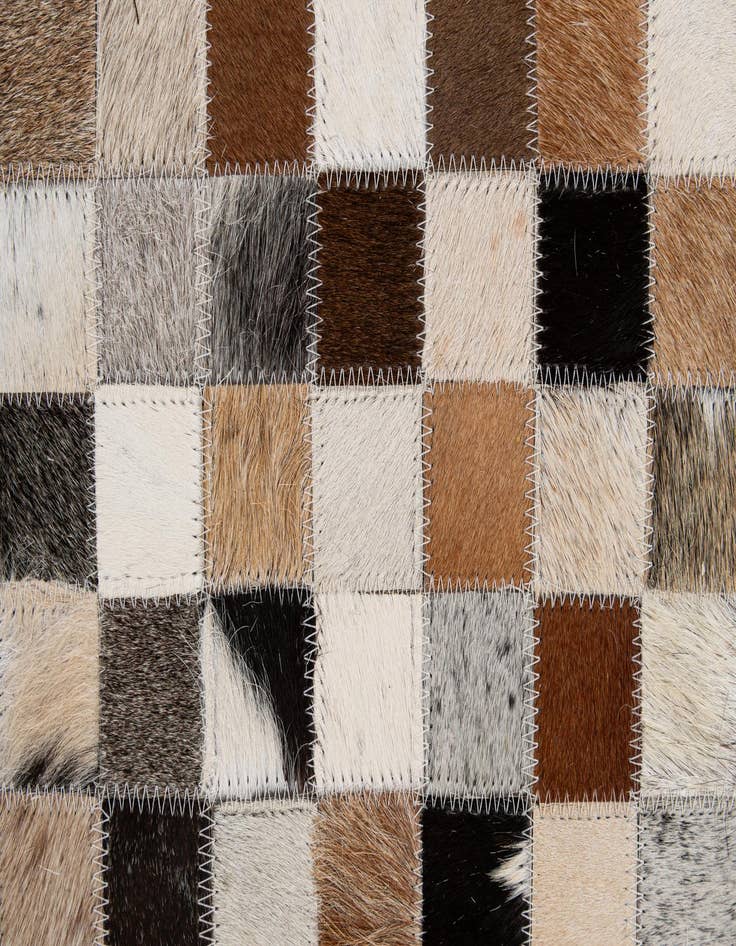 Detail image of  4' 11 x 7' 10 Cowhide - Patchwork Rug