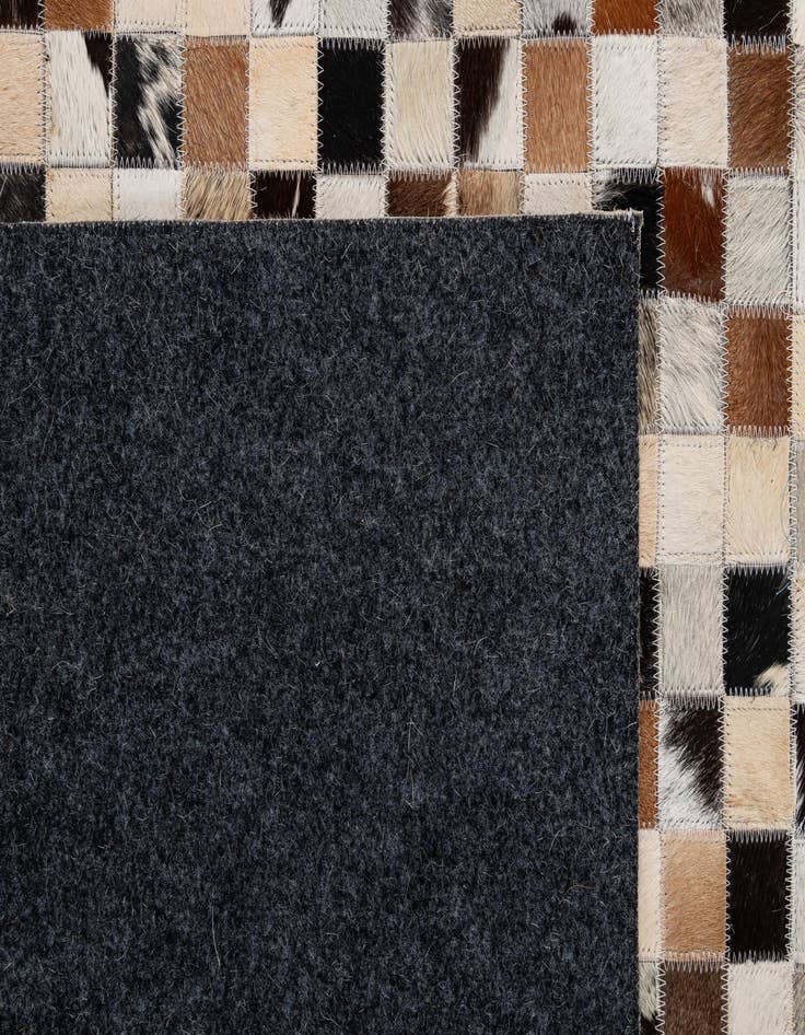 Detail image of  4' 11 x 7' 10 Cowhide - Patchwork Rug