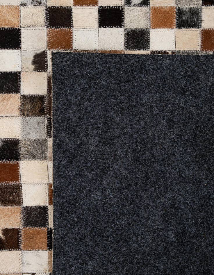Detail image of  5' x 7' 11 Cowhide - Patchwork Rug