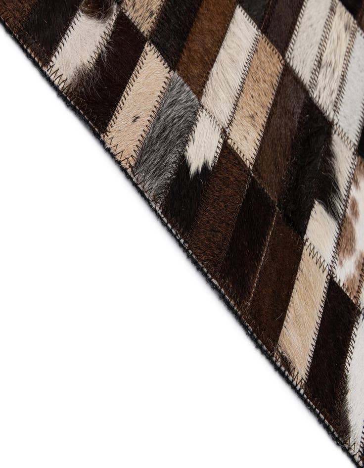 Detail image of  5' x 7' 11 Cowhide - Patchwork Rug