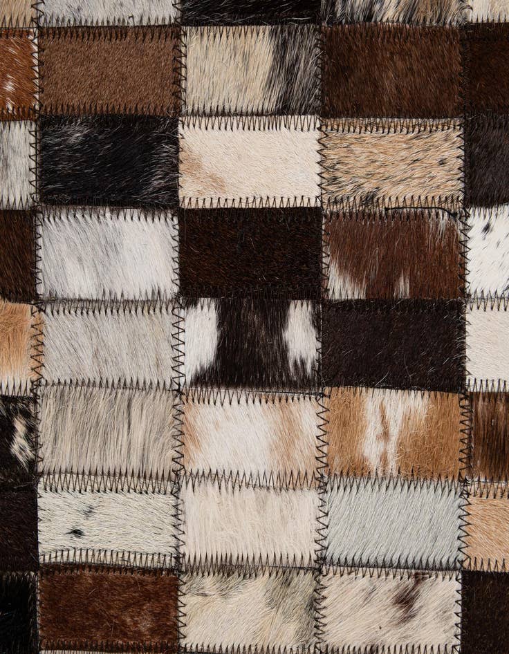 Detail image of  5' x 7' 11 Cowhide - Patchwork Rug