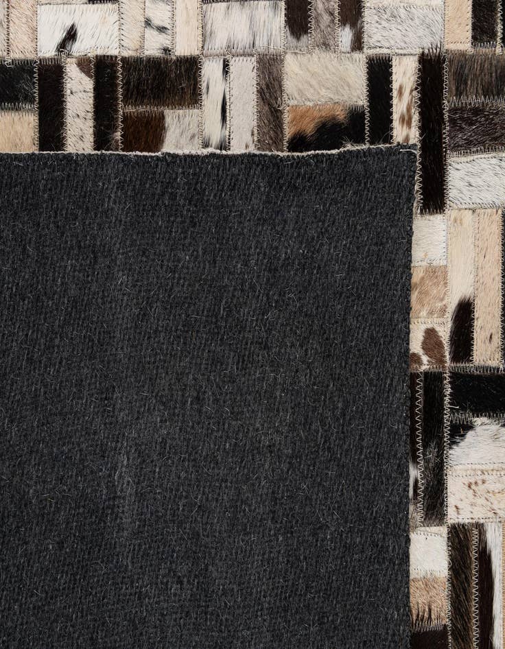 Detail image of  5' x 7' 11 Cowhide - Patchwork Rug