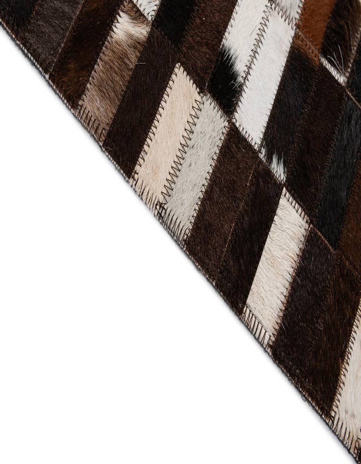 Detail image of  4' 11 x 8' 1 Cowhide - Patchwork Rug