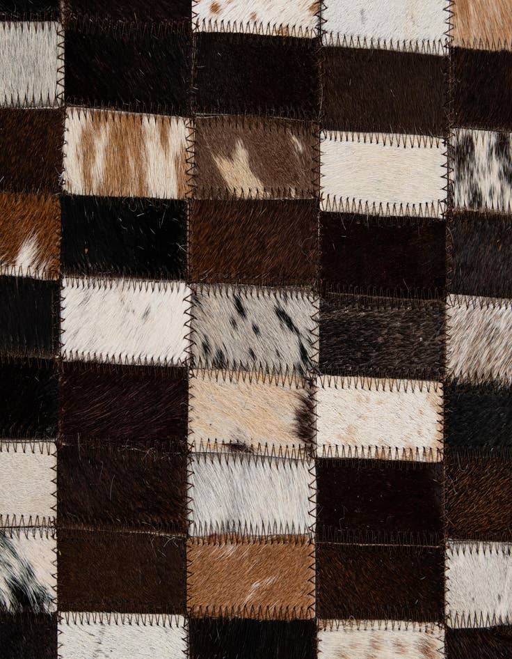 Detail image of  4' 11 x 8' 1 Cowhide - Patchwork Rug