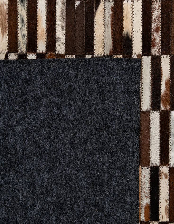Detail image of  4' 11 x 8' 1 Cowhide - Patchwork Rug