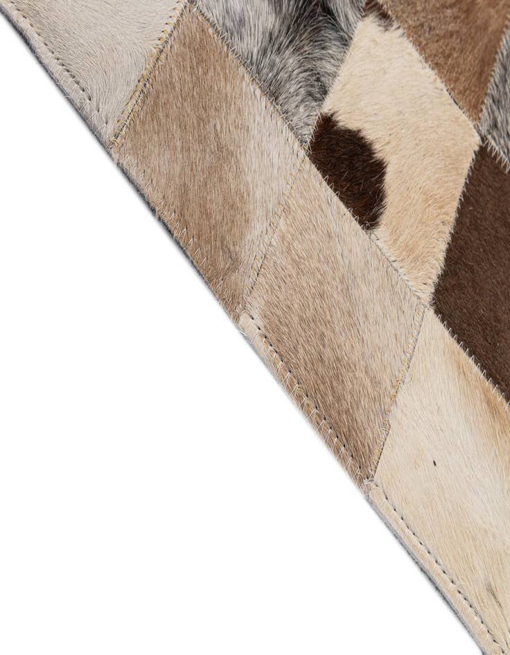 Detail image of  5' 2 x 7' 11 Cowhide - Patchwork Rug
