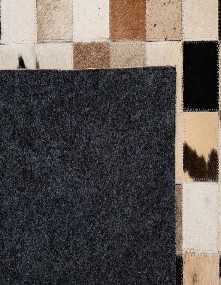 Detail image of  5' 2 x 7' 11 Cowhide - Patchwork Rug