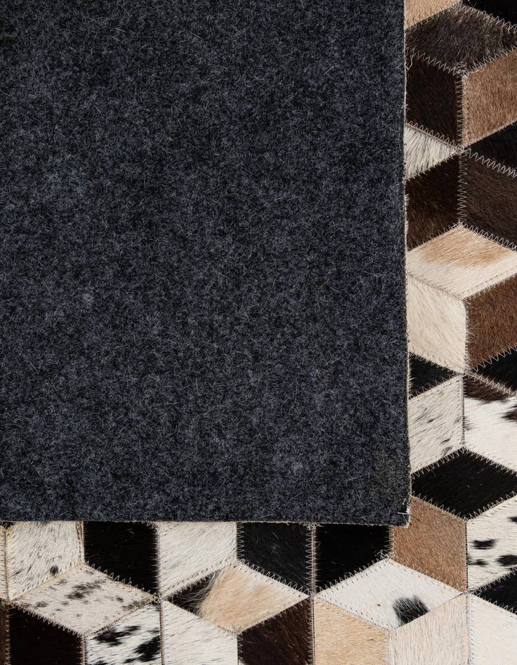 Detail image of  5' 2 x 7' 10 Cowhide - Patchwork Rug