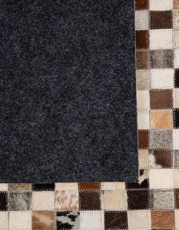 Detail image of  5' 2 x 7' 10 Cowhide - Patchwork Rug