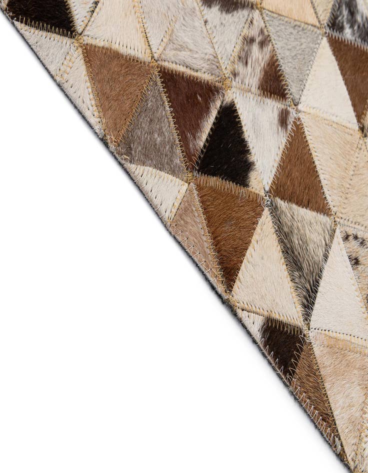 Detail image of  5' 1 x 7' 11 Cowhide - Patchwork Rug