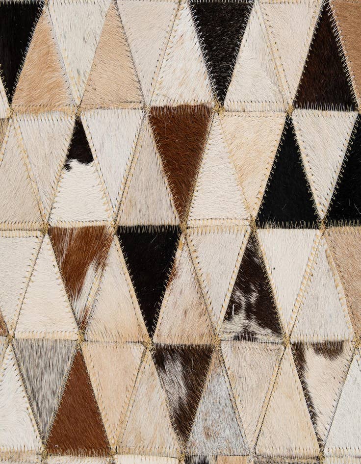 Detail image of  5' 1 x 7' 11 Cowhide - Patchwork Rug