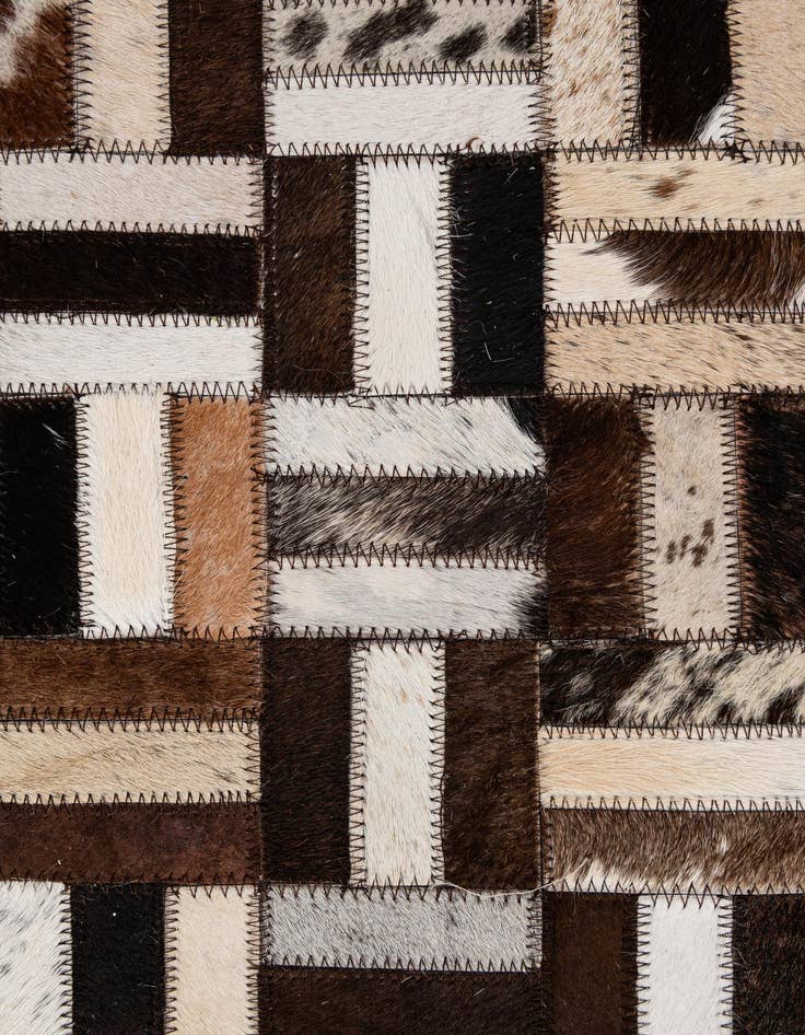 Detail image of  5' 2 x 7' 11 Cowhide - Patchwork Rug