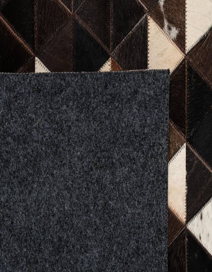 Detail image of  5' 1 x 7' 11 Cowhide - Patchwork Rug