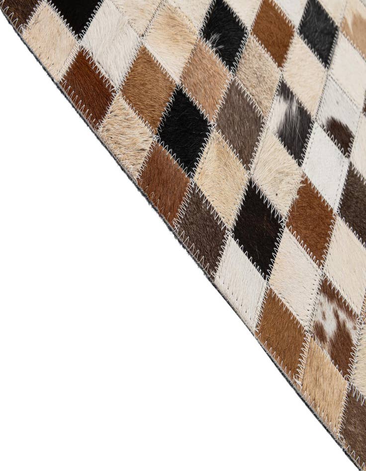 Detail image of  5' x 7' 11 Cowhide - Patchwork Rug