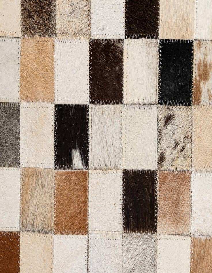 Detail image of  5' 1 x 7' 11 Cowhide - Patchwork Rug