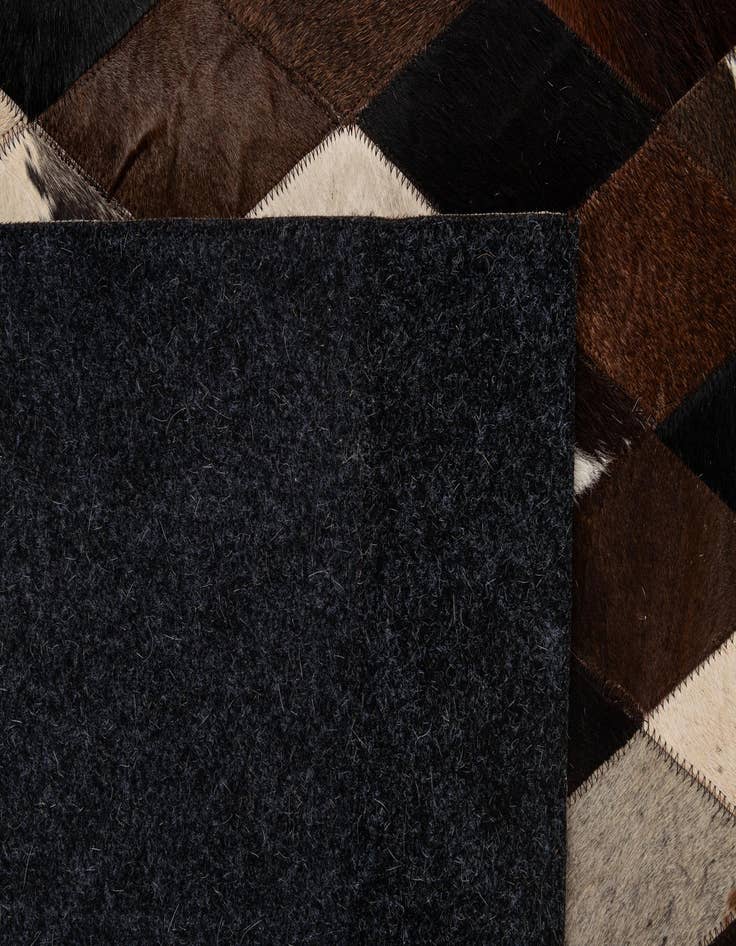 Detail image of  5' 10 x 8' Cowhide - Patchwork Rug