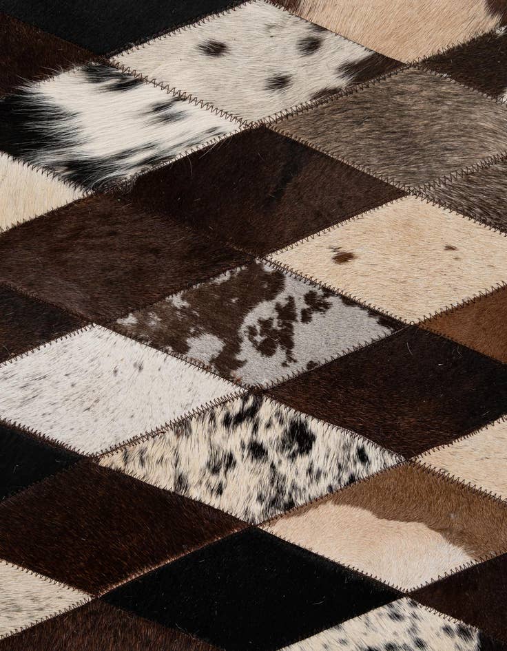 Detail image of  5' 10 x 8' 1 Cowhide - Patchwork Rug