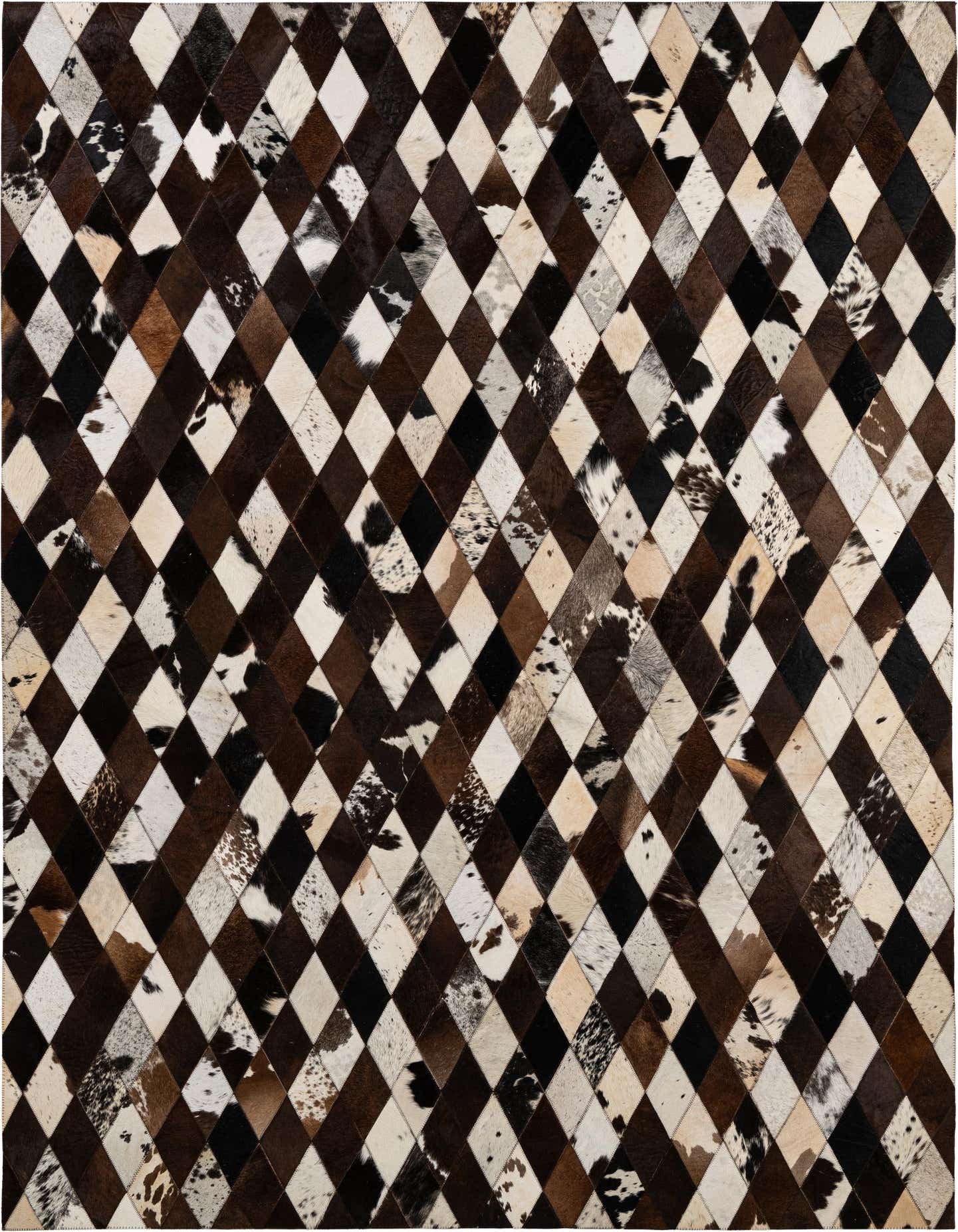 A 6x9 rectangular patchwork cowhide rug featuring a modern diamond pattern in multi-colored natural brown, black, and white tones.