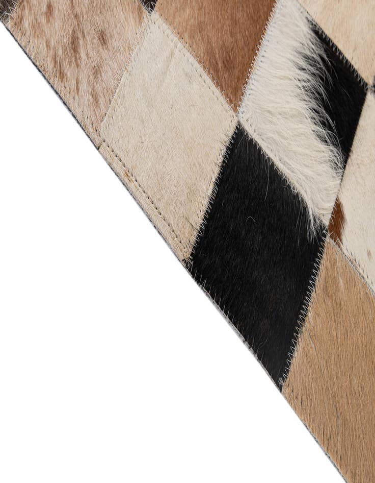 Detail image of  5' 2 x 8' 1 Cowhide - Patchwork Rug